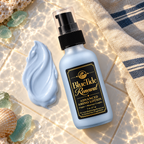 BlueTide Renewal lotion bottle beside a smooth pale blue lotion swatch on ivory ceramic.