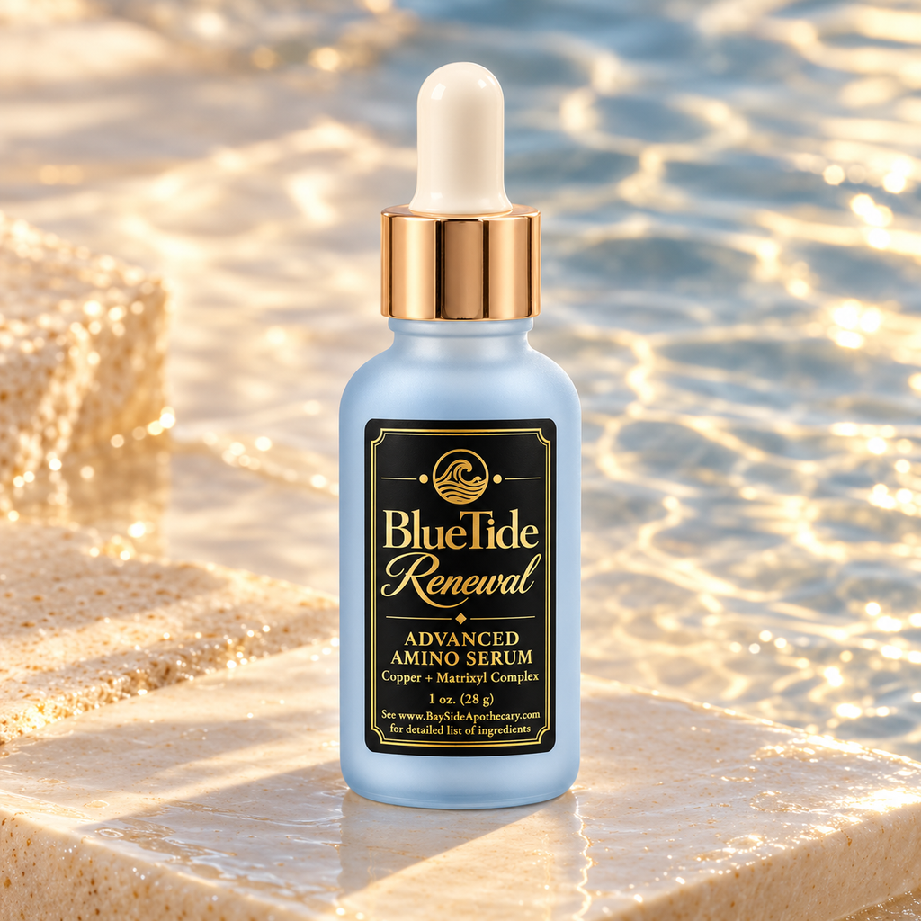 BlueTide Renewal serum bottle in soft coastal light with water reflections.