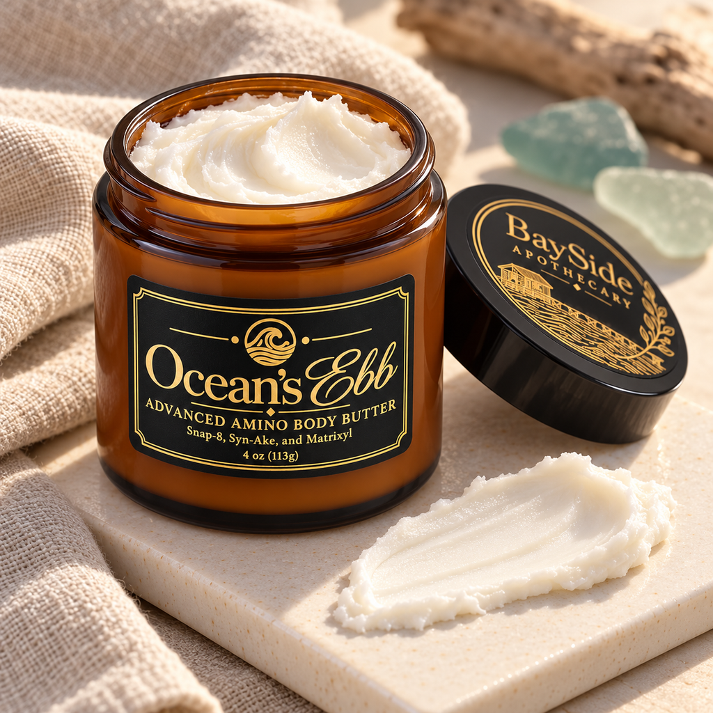 Open Ocean's Ebb body butter jar showing its rich white texture beside a small swatch.