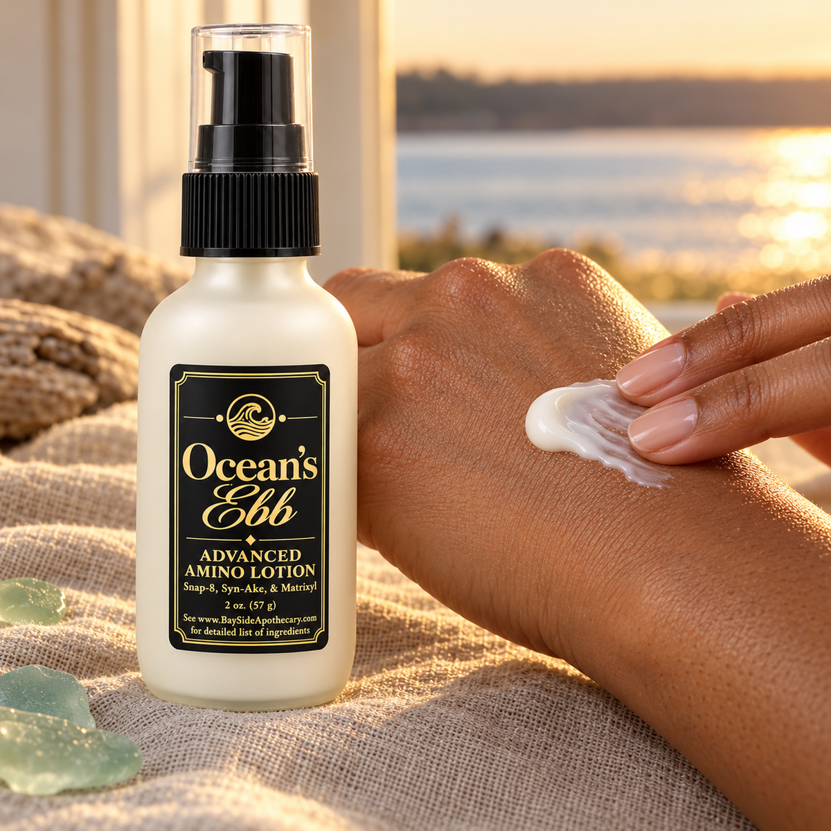White Ocean's Ebb lotion being spread on the back of a hand beside the bottle.